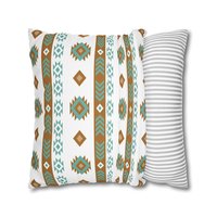 Pillowcase with tribal art in white, light teal, tan, and brown. Each side has a different Aztec design using the same color palette.