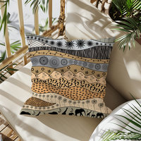 Neutral African Art Pillow on a balcony chair