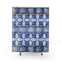 shower curtain - Coastal design of blue denim stripes with spiral seashells and a nautical rope border on a watercolor ikat pattern background.