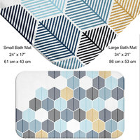 Abstract honeycomb-shaped trees design bath mat in navy blue, rackley blue, light blue and gold (not glittery) on a white background.