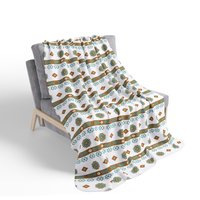 plush velveteen throw blanket in white, light teal, tan, and brown.