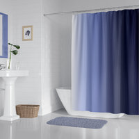 Blue Ombré Stripes Shower Curtain hung in a modern white bathroom