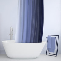 Blue Ombré Stripes Shower Curtain partially hidden by a bathtub