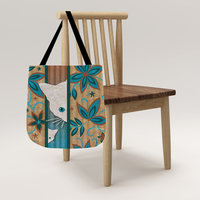 Mama Cat and Kitten Woven Tapestry Bag hanging on a chair.