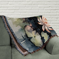 Water Lilies Woven Cotton Blanket folded on a couch