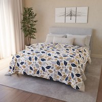 Botanical art printed on a lightweight, soft and fluffy two-sided reversible plush velveteen throw blanket in white, navy blue, tan, gray, orange and brown. One side is printed on a white background and the other side is printed on a navy blue background.