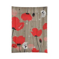 Twin size comforter with Red and pink flowers with black and white dandelion seed pods on a taupe background.