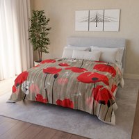 Large Bold Red Poppy Fleece Blanket on a bed