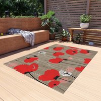Bold Red Poppy Rug in a back yard