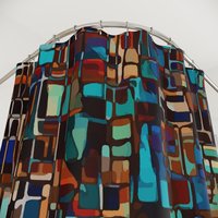 Turquoise, orange, brown and black stained glass color block design shower curtain top view