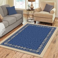 Blue Maze Rug with Beige Celtic Knot Border displayed on a wood floor in a neutral living room.