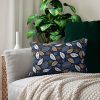 Leaf Design Reversible Lumbar Pillow on a couch
