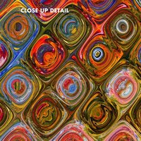 Colorful Boho Rug – Orange Mosaic Pattern with Retro Flair close up detail.