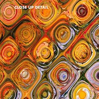 Colorful Boho Rug – Orange Mosaic Pattern with Retro Flair close up details.