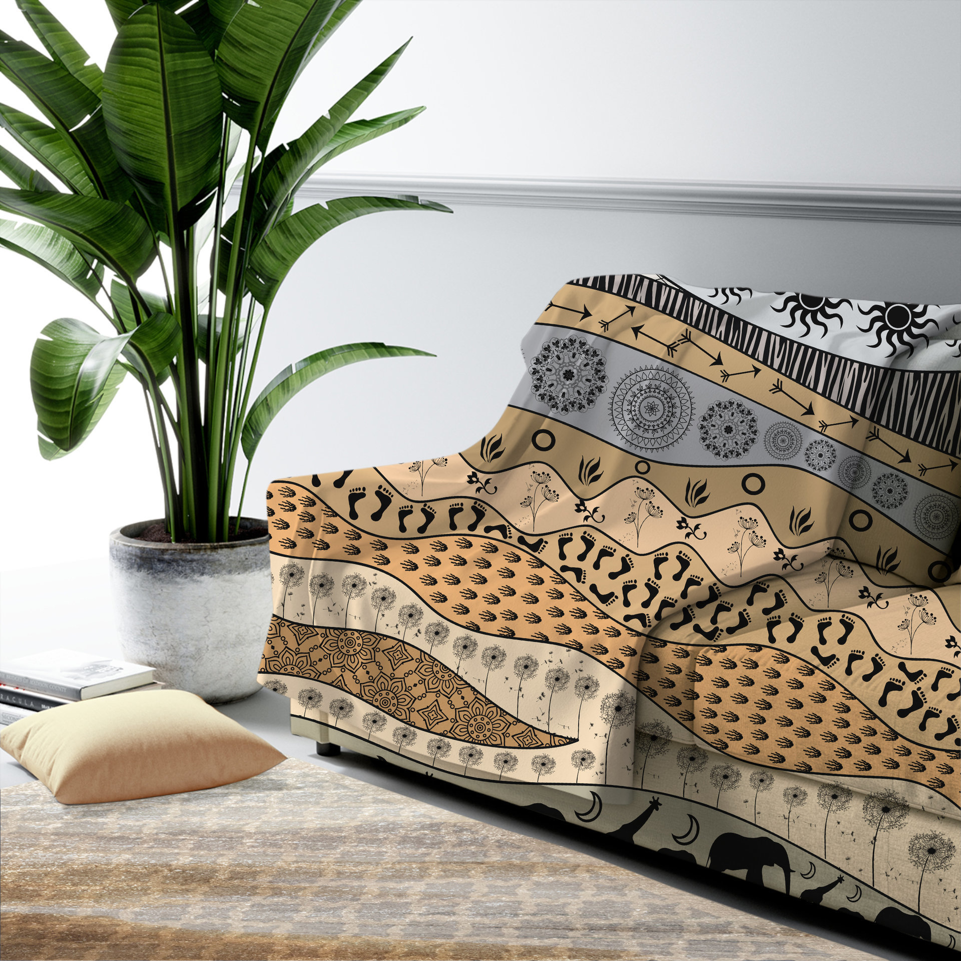 Large neutral African Art Fleece Blanket on a couch