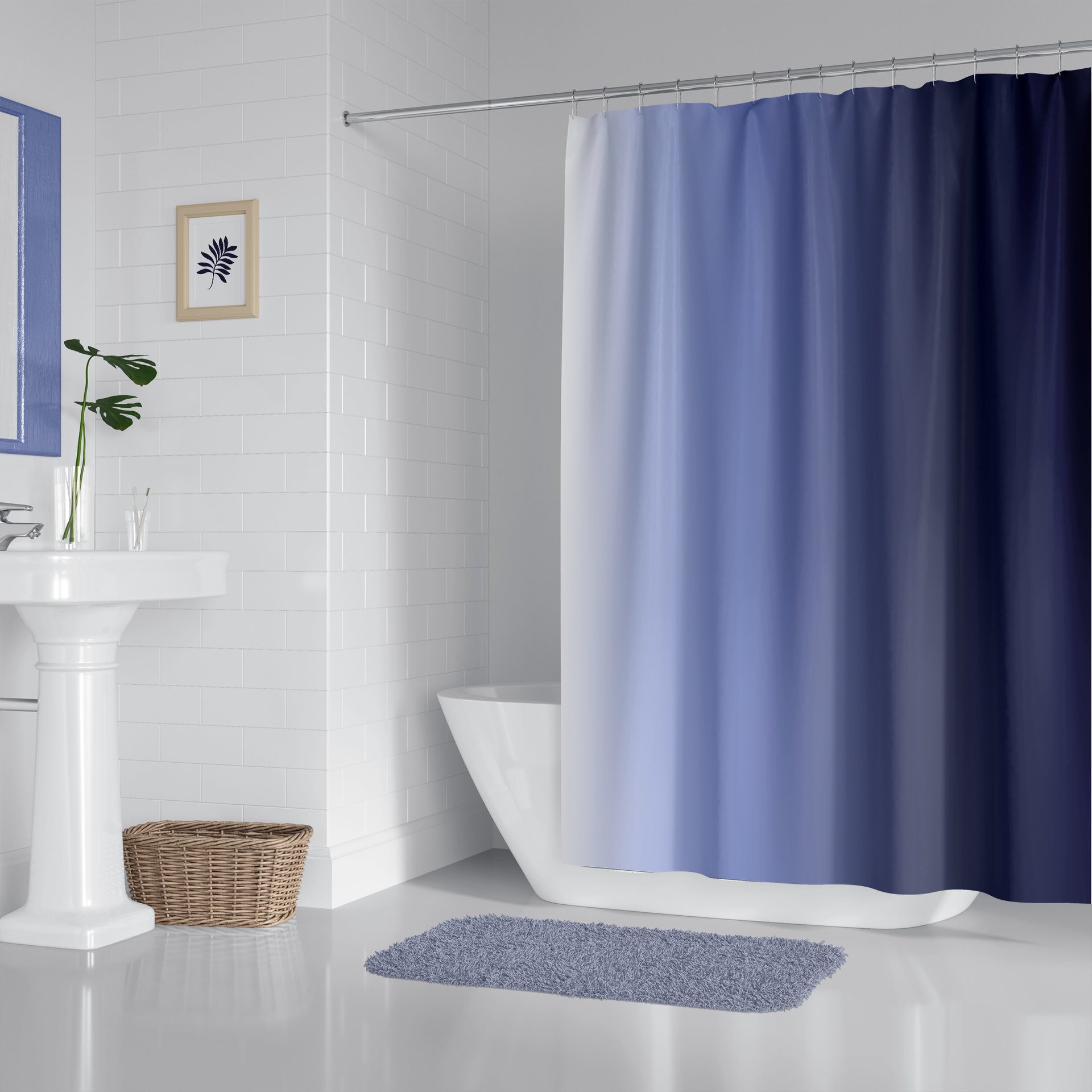 Blue Ombré Stripes Shower Curtain hung in a modern white bathroom