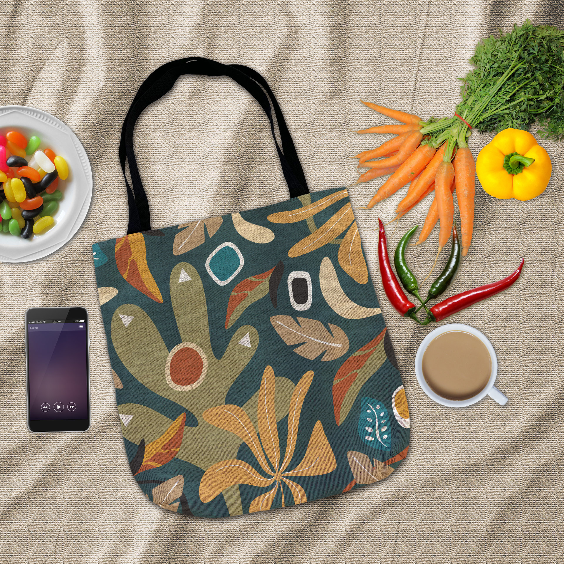 Flat lay Multicolor Abstract Floral Woven Tote with groceries and a phone