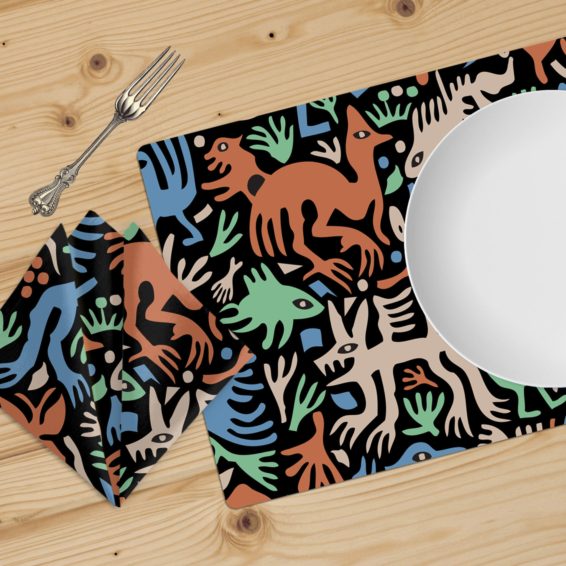 Table linens with Cute folk art of otherworldly dinosaurs, flora and fauna in brown, beige, green and blue on a black background.