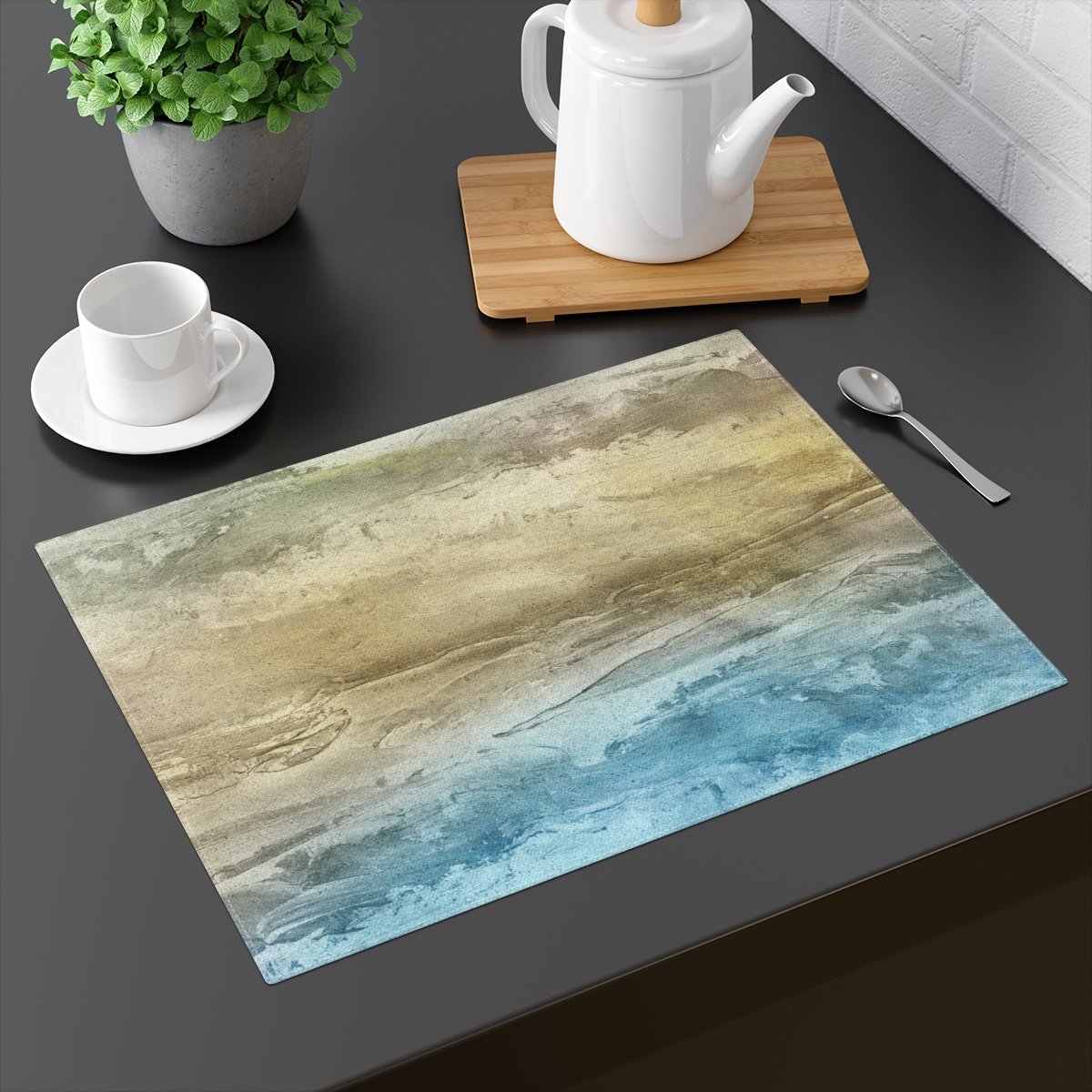sandy beach placemat on a gray table