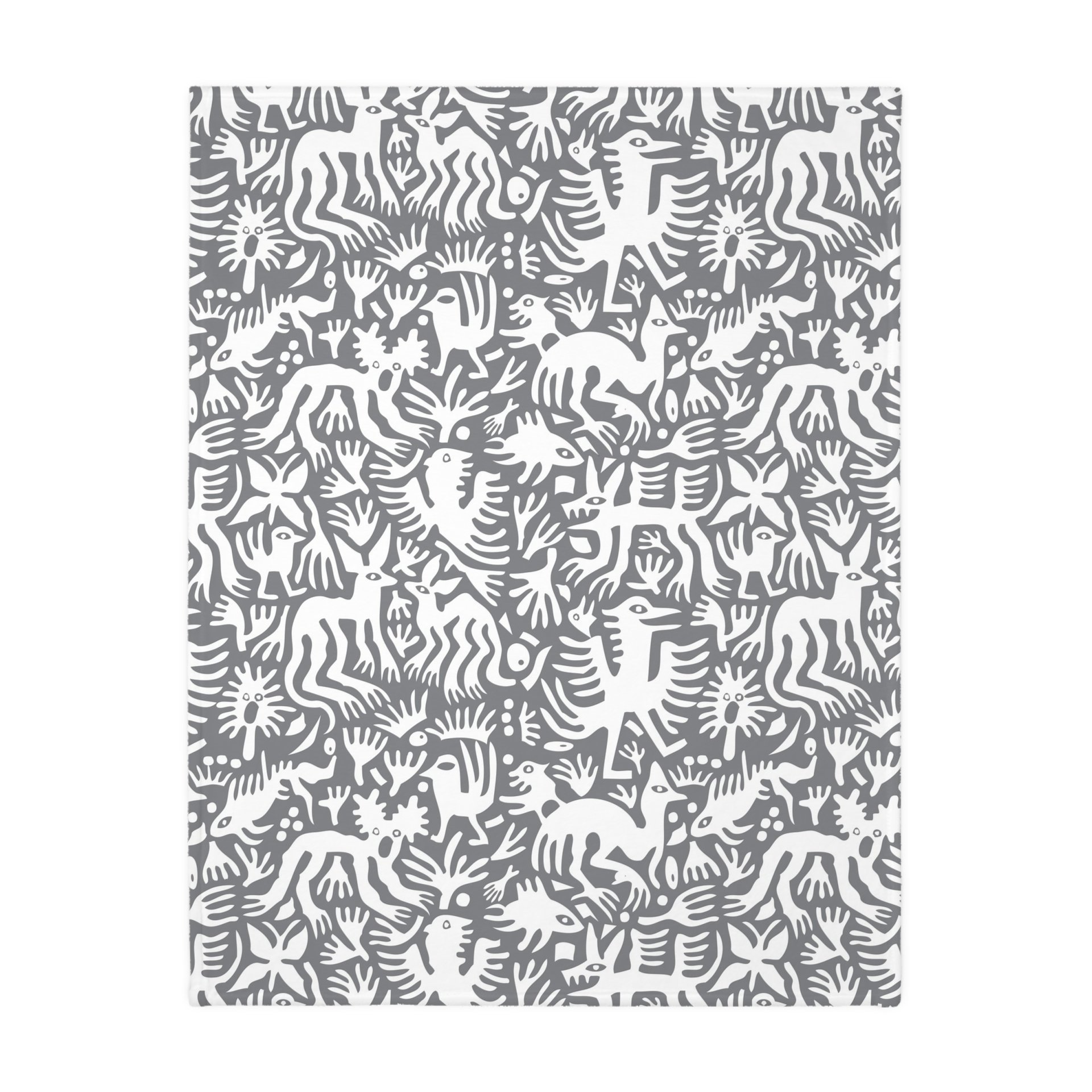 Gray side. White hand-drawn folk art animals and plants printed on a lightweight, soft and plush two-sided velveteen throw blanket.