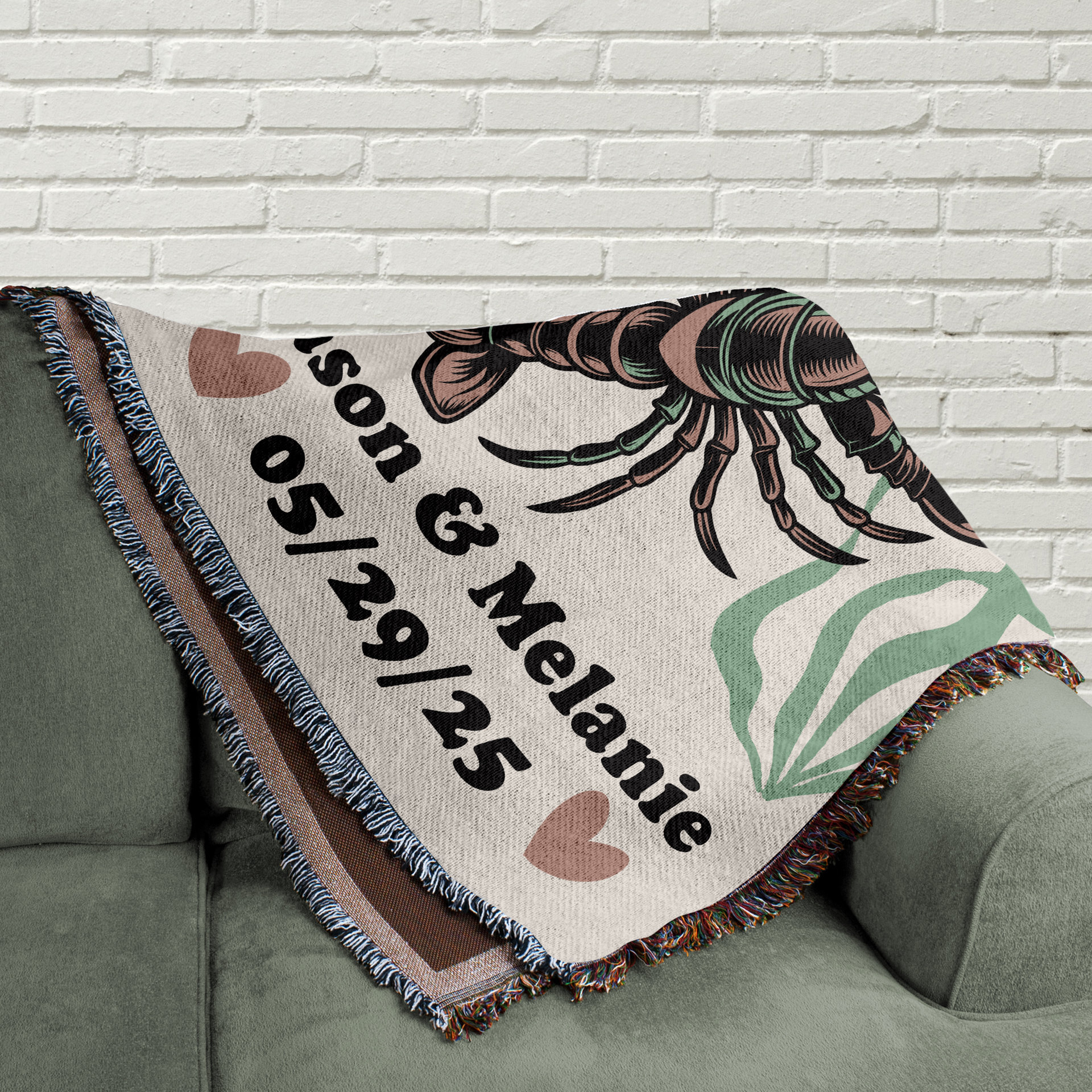 Personalized Woven Blanket – “I Found My Lobster” folded on a couch.