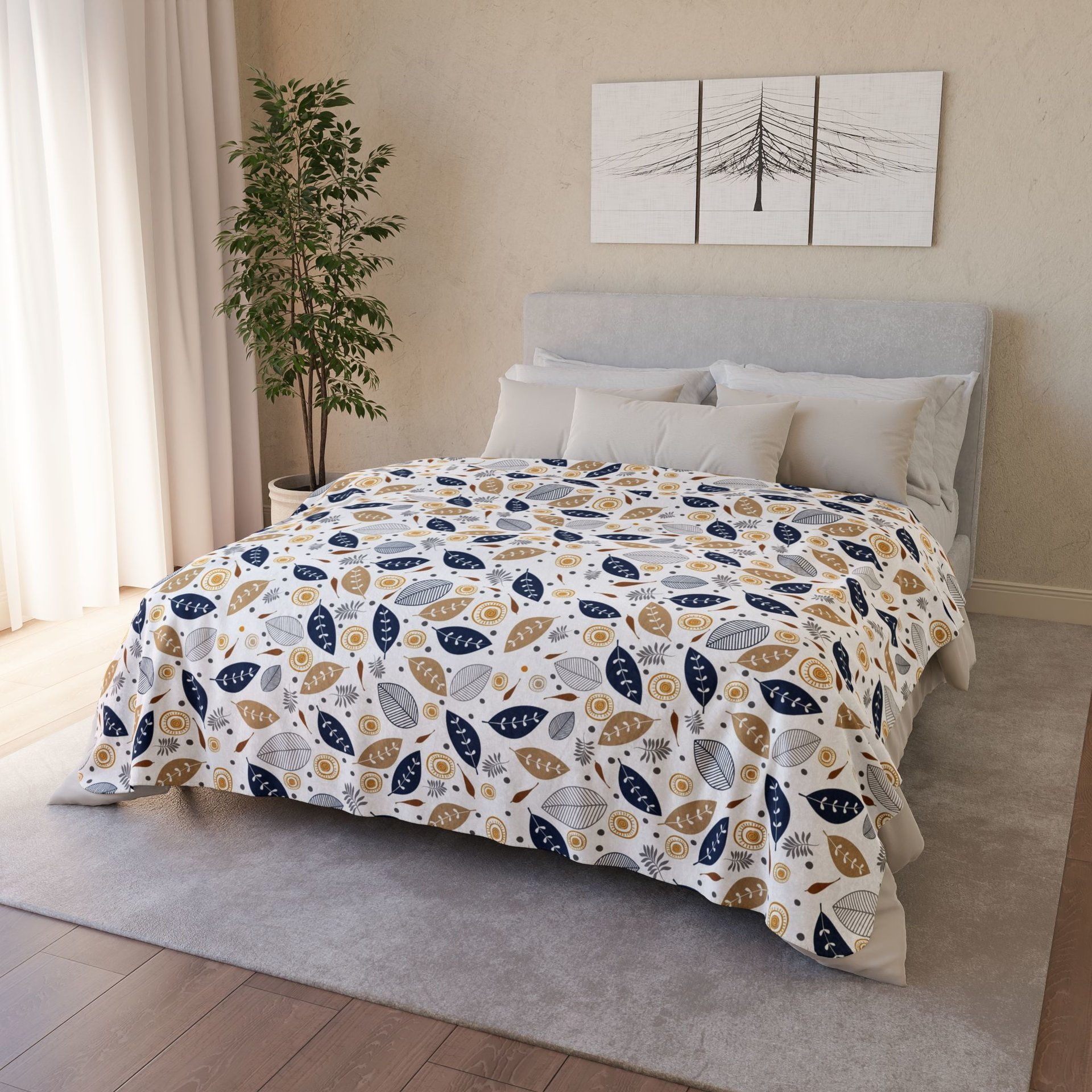 Botanical art printed on a lightweight, soft and fluffy two-sided reversible plush velveteen throw blanket in white, navy blue, tan, gray, orange and brown. One side is printed on a white background and the other side is printed on a navy blue background.