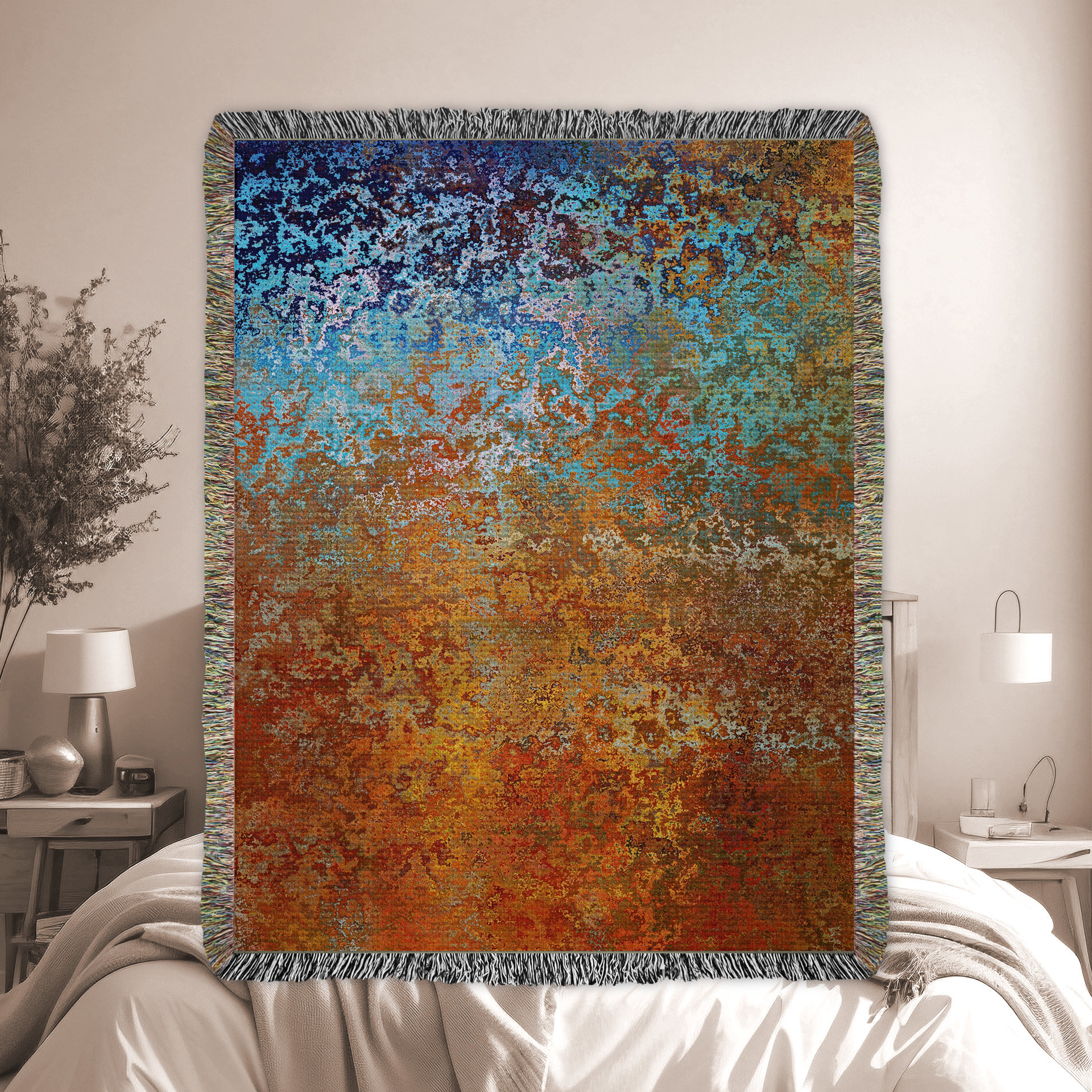 Abstract Ombré Woven Blanket in Southwestern Colors in a modern bedroom.