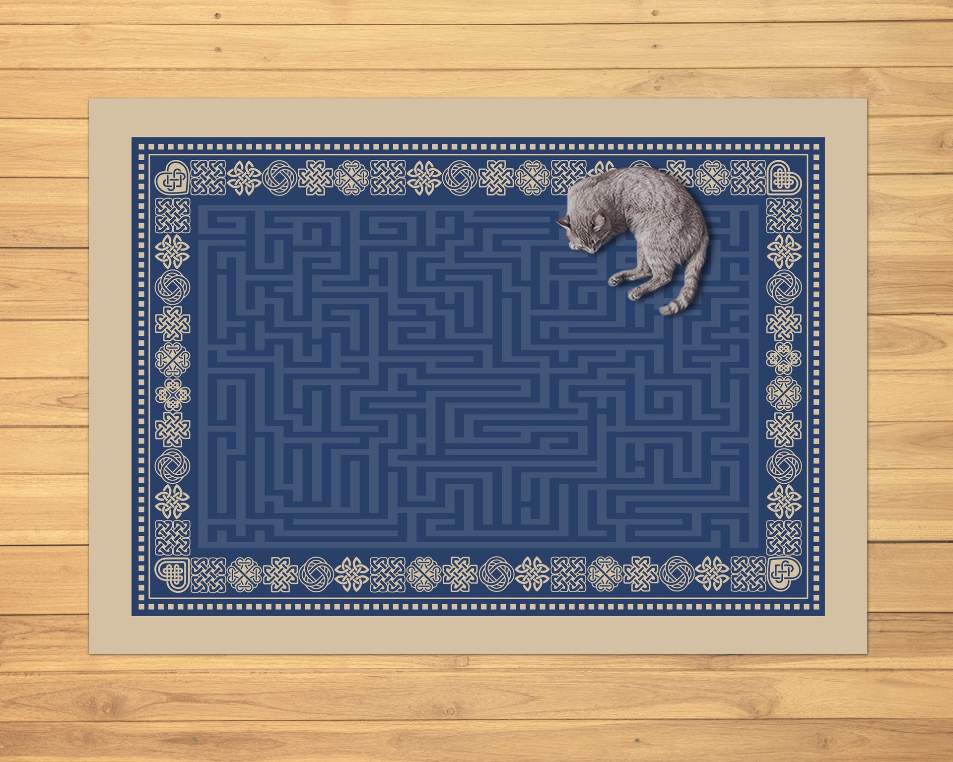 Blue Maze Rug with Beige Celtic Knot Border on a wood floor with a cat curled up in the corner