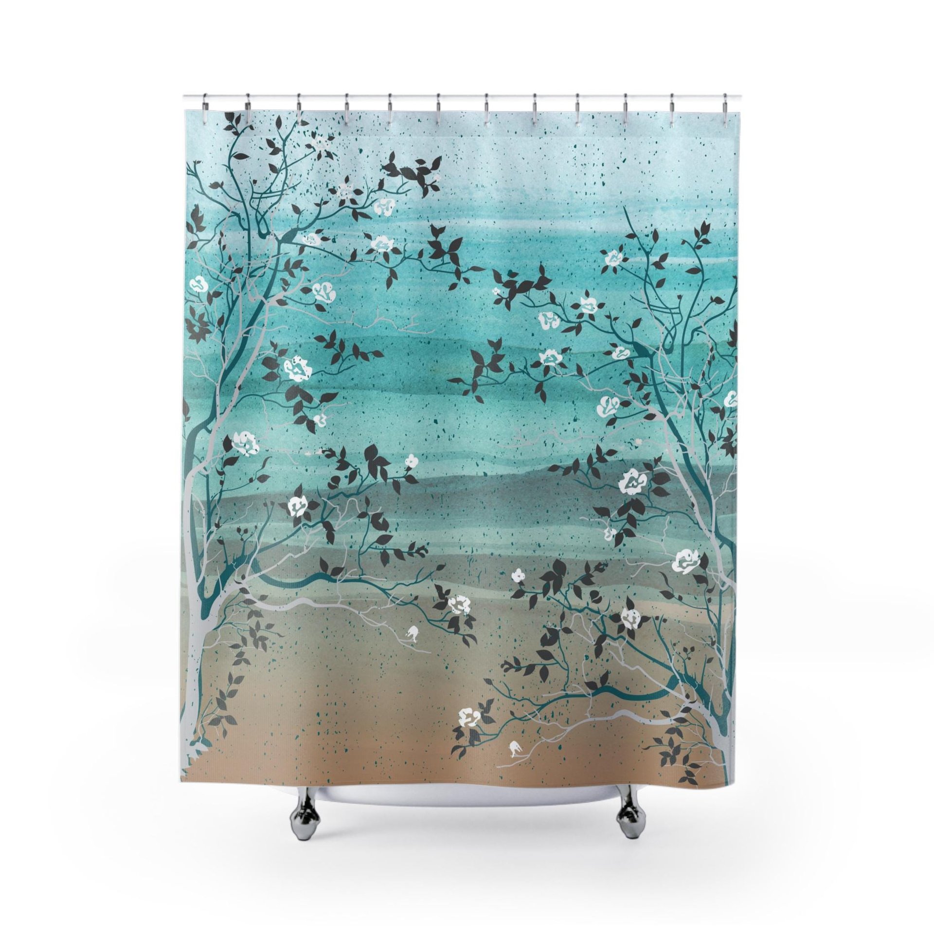 Muted sand, aqua, green, tan and gray ocean waves with white flowering trees in the foreground printed on a well made, water-resistant, polyester fabric shower curtain with a 12 button-hole top for hanging.