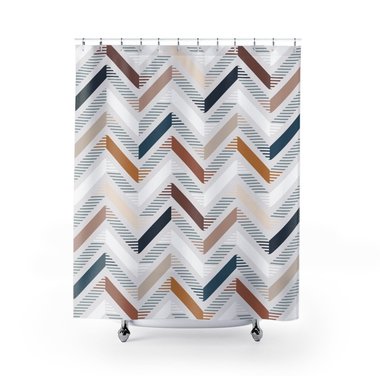 Shower curtain with an unusual abstract geometric zig-zag pattern in browns, blues, gray and white on an off-white textured background.